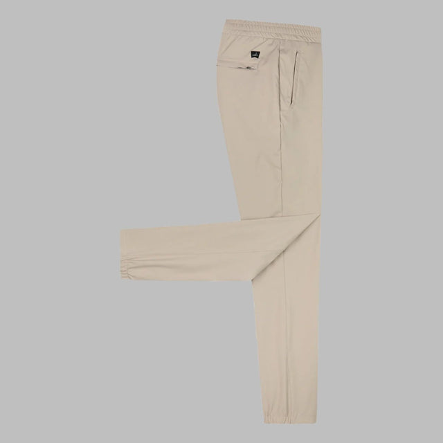 WAHTS TECH STRETCH TROUSERS STONE BEIGE - Hombre Amsterdam
